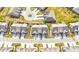New construction aerial view of a neighborhood featuring similar townhomes in a desirable, walkable community at 1126 Talisker Way, Burlington, NC 27215