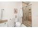 Bathroom featuring a tiled walk-in shower with glass doors at 1126 Talisker Way, Burlington, NC 27215