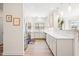 Bright kitchen with white cabinets, subway tile backsplash, and stainless-steel appliances at 1126 Talisker Way, Burlington, NC 27215