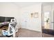 Bright home office area featuring a modern desk setup, comfortable chair, and ample space at 1126 Talisker Way, Burlington, NC 27215