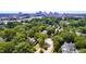 Aerial view of the neighborhood with city skyline in the distance at 1200 Glenwood Ave, Raleigh, NC 27605