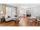Elegantly decorated living room with hardwood floors and an abundance of natural light at 1200 Glenwood Ave, Raleigh, NC 27605