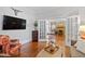 Inviting living room with hardwood floors, stylish furnishings and decorative accents at 1200 Glenwood Ave, Raleigh, NC 27605