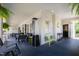 Spacious covered porch with multiple seating arrangements and stylish decor at 1200 Glenwood Ave, Raleigh, NC 27605