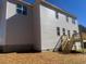 The backyard features a newly constructed deck with stair access from the home at 122 Reece Dr, Sanford, NC 27332