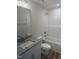 Bathroom showcasing the tub, shower, granite countertops, and single sink at 122 Reece Dr, Sanford, NC 27332
