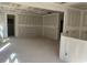 Spacious living room featuring unfinished drywall, ideal for customization at 122 Reece Dr, Sanford, NC 27332