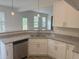 Modern kitchen area featuring granite countertops, stainless steel appliances and an open concept layout at 122 Reece Dr, Sanford, NC 27332