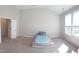 Bright bedroom featuring neutral walls, carpet, and a window view at 1520 Village Grove Ct, Hillsborough, NC 27278