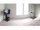 Bonus room with TV and a treadmill at 1520 Village Grove Ct, Hillsborough, NC 27278