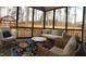 Comfortable screened porch with seating at 1520 Village Grove Ct, Hillsborough, NC 27278