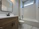 Modern bathroom with a tiled shower, sleek fixtures, and a vanity with contemporary design at 165 Cotton Fields Ln # 25, Fuquay Varina, NC 27526