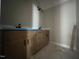 A bathroom features a new double vanity with black hardware and light-colored walls at 165 Cotton Fields Ln # 25, Fuquay Varina, NC 27526