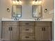 Bathroom with double vanity, shaker cabinets, quartz countertop, and modern lighting at 165 Cotton Fields Ln # 25, Fuquay Varina, NC 27526