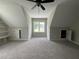 Spacious bedroom featuring carpet flooring, storage cubbies and a large window for ample natural light at 165 Cotton Fields Ln # 25, Fuquay Varina, NC 27526