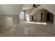 A bright unfinished bedroom offers a closet and built-in shelving with natural light at 165 Cotton Fields Ln # 25, Fuquay Varina, NC 27526