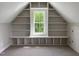 Bonus room featuring built-in shelving and window with backyard view at 165 Cotton Fields Ln # 25, Fuquay Varina, NC 27526
