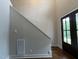 Grand entryway features soaring ceilings and dark-stained French doors to let light in at 165 Cotton Fields Ln # 25, Fuquay Varina, NC 27526