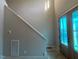 Bright entryway with double doors and staircase, offering a welcoming first impression at 165 Cotton Fields Ln # 25, Fuquay Varina, NC 27526