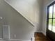 Entryway with hardwood floors, trim details, and a stylish front door at 165 Cotton Fields Ln # 25, Fuquay Varina, NC 27526
