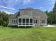 Lovely home featuring a screened-in porch and a spacious, well-maintained backyard at 165 Cotton Fields Ln # 25, Fuquay Varina, NC 27526