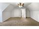 Large bedroom featuring carpet flooring, a ceiling fan, and a closet, providing comfort and functionality at 204 Colonial Dr, Clayton, NC 27527