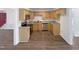 Traditional kitchen with wooden cabinetry, updated countertops and stainless steel appliances at 204 Colonial Dr, Clayton, NC 27527