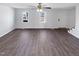 Spacious living room featuring hardwood floors and natural light at 204 Colonial Dr, Clayton, NC 27527