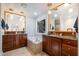 Luxurious bathroom with dual vanities, soaking tub, and natural light at 221 Saddle Ridge Rd, Chapel Hill, NC 27514
