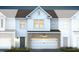 Charming two-story home with brick-accented facade and inviting attached two-car garage at 269 Broomside Ave, Raleigh, NC 27603
