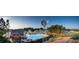 Aerial view of the community pool, clubhouse, and surrounding homes showcases the community's layout at 270 Inspiration Way Way, Fuquay Varina, NC 27526