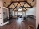 Spacious clubhouse featuring vaulted wood ceilings, a stone fireplace, seating, and abundant natural light at 270 Inspiration Way Way, Fuquay Varina, NC 27526