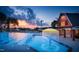 Community swimming pool with water features and beautiful sunset views creating a relaxing oasis at 270 Inspiration Way Way, Fuquay Varina, NC 27526