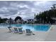Large community pool with plenty of lounge chairs and seating, perfect for relaxation and recreation at 270 Inspiration Way Way, Fuquay Varina, NC 27526