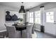Cozy dining area with modern lighting and views of the outdoors at 285 Broomside Ave, Raleigh, NC 27603