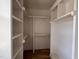 A walk-in closet offers custom built-in shelving and ample storage space at 309 Deer Tail Ln # 42, Fuquay Varina, NC 27526