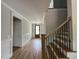 The home's grand entryway features hardwood floors and traditional wainscoting at 309 Deer Tail Ln # 42, Fuquay Varina, NC 27526