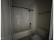 Bathroom showing tiled shower with subway tile and niche at 309 Deer Tail Ln # 42, Fuquay Varina, NC 27526