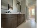 Bathroom boasts a double vanity with modern fixtures and a view into the adjoining room at 318 Deer Tail Ln # 35, Fuquay Varina, NC 27526