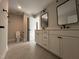 Bathroom with tile flooring, double vanity, and toilet at 318 Deer Tail Ln # 35, Fuquay Varina, NC 27526