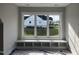 Window seat area with built in storage looking out to the backyard of the property at 318 Deer Tail Ln # 35, Fuquay Varina, NC 27526