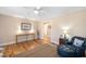 Spacious living room featuring hardwood floors and stylish decor at 326 Lake Dr, Wendell, NC 27591