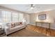 Bright and airy living room with hardwood floors and a neutral color palette at 326 Lake Dr, Wendell, NC 27591