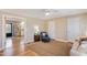 Inviting living room featuring hardwood floors and comfortable seating with kitchen view at 326 Lake Dr, Wendell, NC 27591