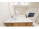 Bathroom vanity featuring double sinks, white countertop and shaker cabinets at 3930 Willow Gate Way, Raleigh, NC 27604