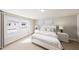 Bright bedroom with large windows, neutral decor, and a comfortable bed with stylish linens at 3930 Willow Gate Way, Raleigh, NC 27604