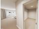 Neutral bedroom with a walk-in closet, large window, and carpeted floor at 3930 Willow Gate Way, Raleigh, NC 27604