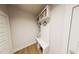 Hallway with built-in bench, coat rack, and basket storage, offering a functional and organized entryway at 3930 Willow Gate Way, Raleigh, NC 27604