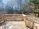 Wooden back deck overlooking a spacious, tree-filled yard at 4204 Labrador Dr, Raleigh, NC 27616