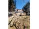 Back of home showcasing the wooden deck and lush yard surrounded by trees at 4204 Labrador Dr, Raleigh, NC 27616